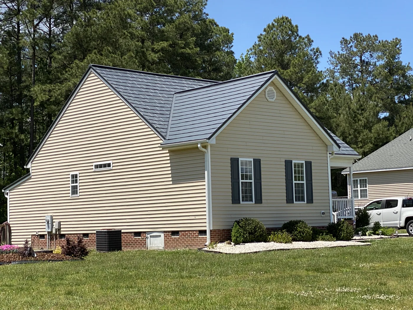 Completed metal roofing project by Milan's Roofing