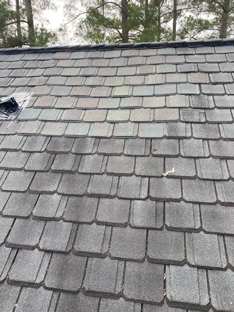 Rustic metal shingle roofing project